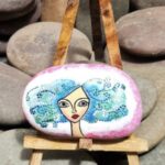 Stone painting by Nehal -curly hair lady