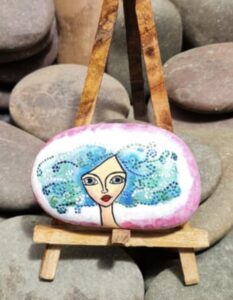 Stone painting by Nehal -curly hair lady
